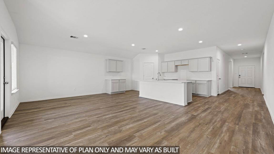 Open concept living, dining, and kitchen area