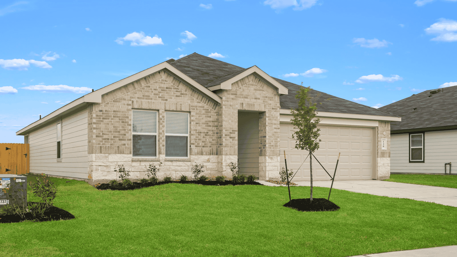 single story home with 2 car garage