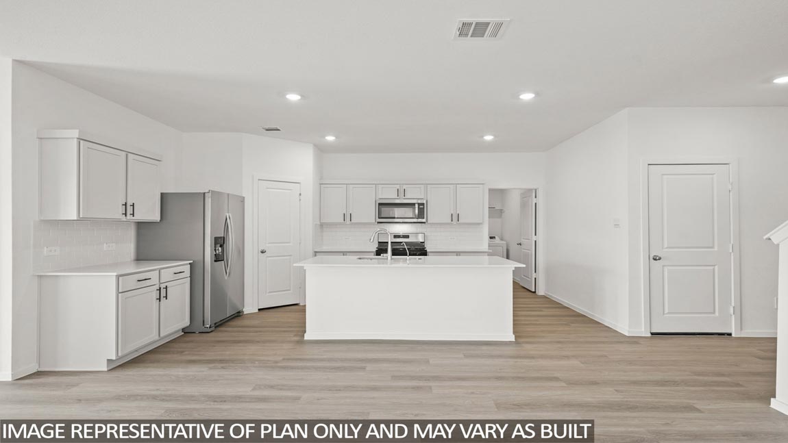 L- shaped kitchen with an island