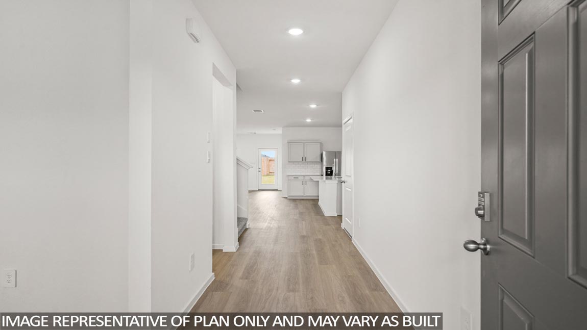 Entry hallway with vinyl flooring