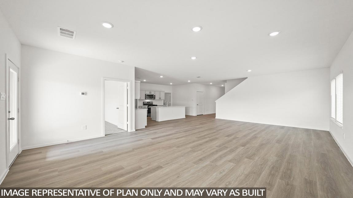 Open concept living, dining, and kitchen area
