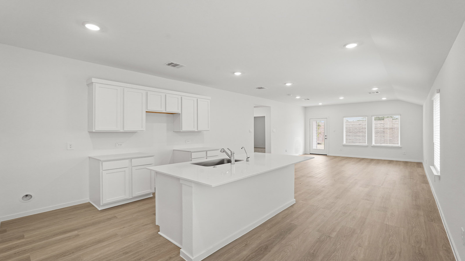 Open concept living, dining, and kitchen area