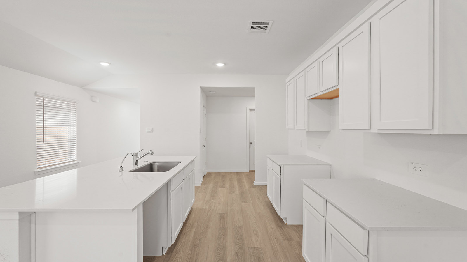 Open concept living, dining, and kitchen area