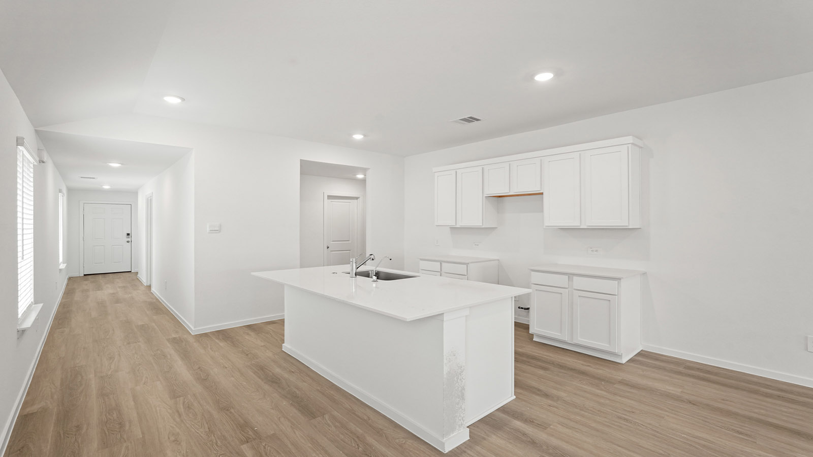 Open concept living, dining, and kitchen area