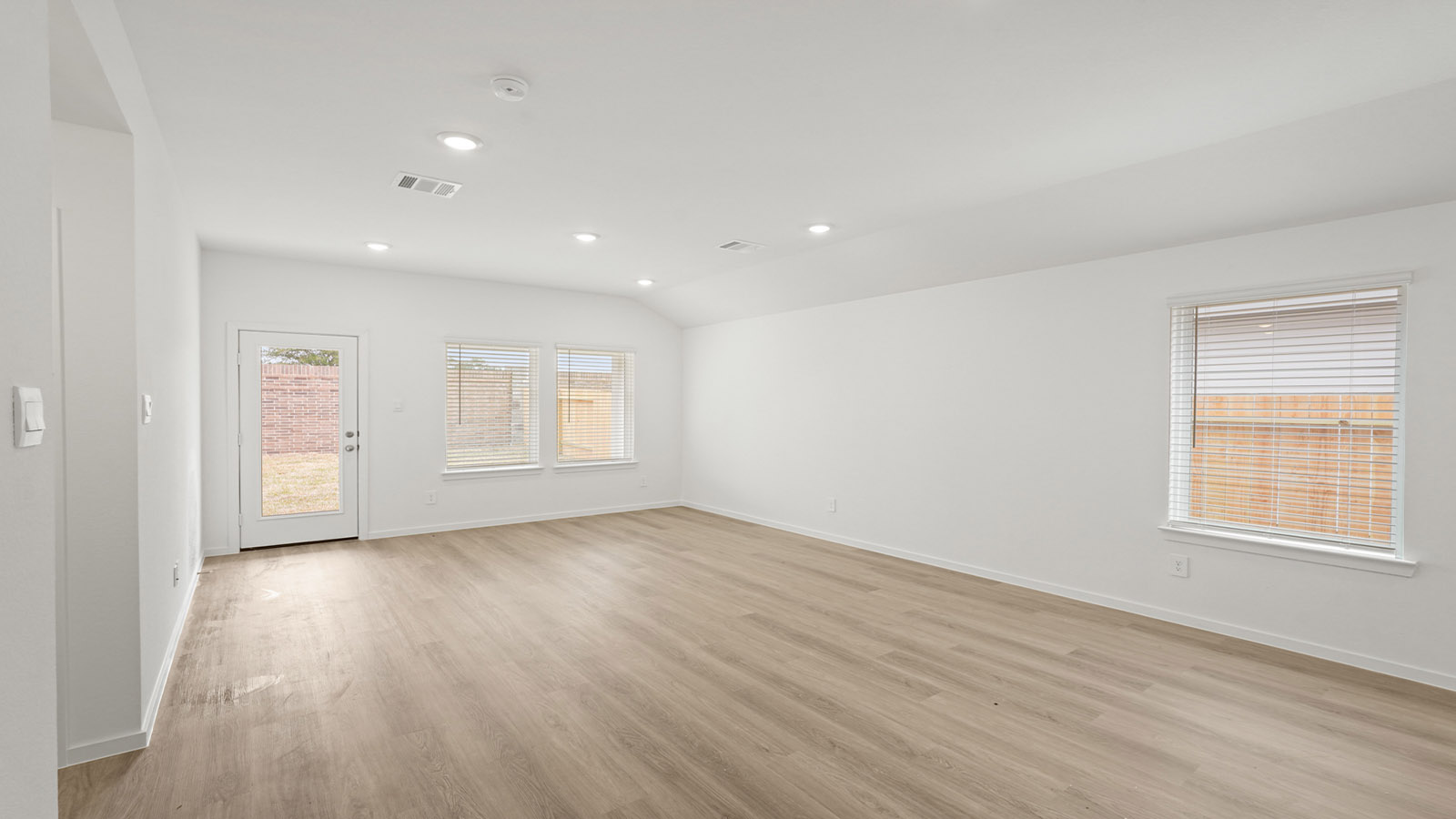 Open concept living, dining, and kitchen area