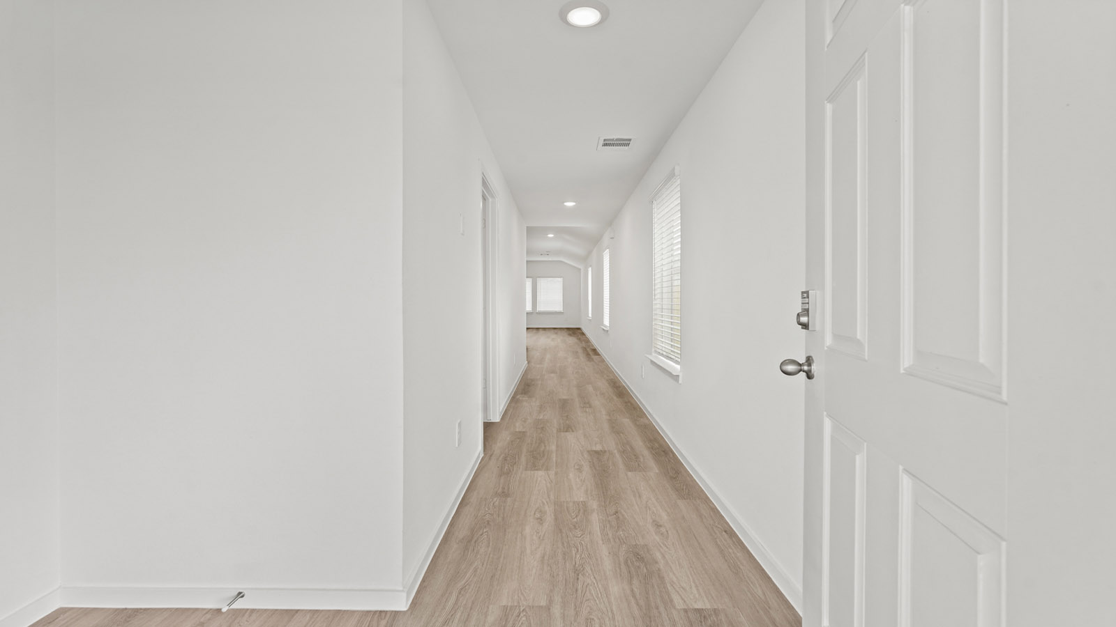 Entry hallway with vinyl flooring