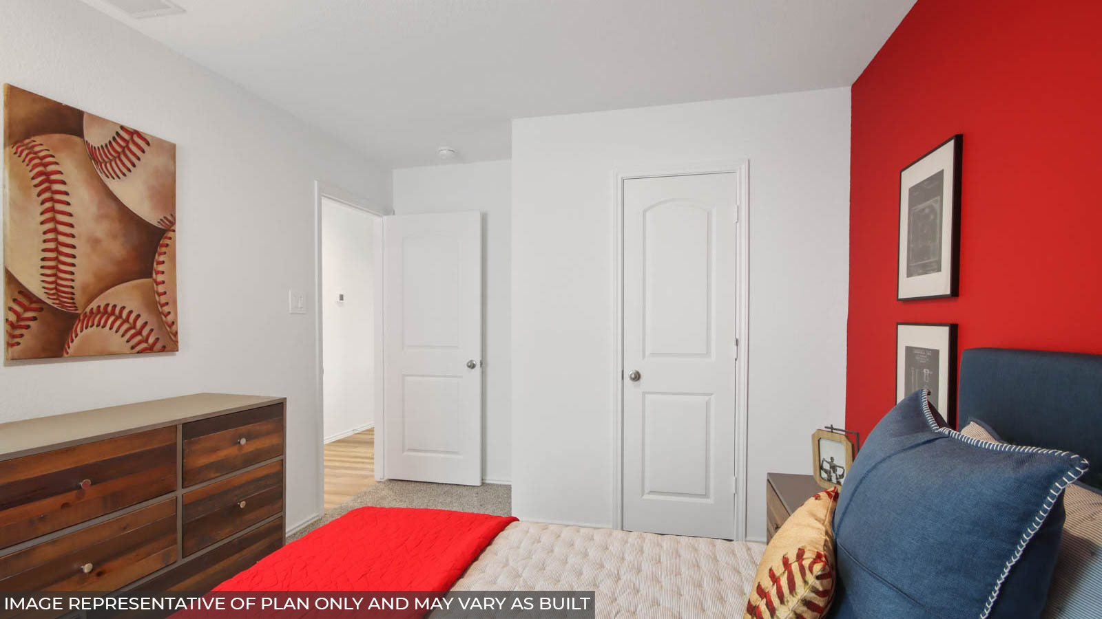Secondary bedroom with carpet flooring and a bright window.