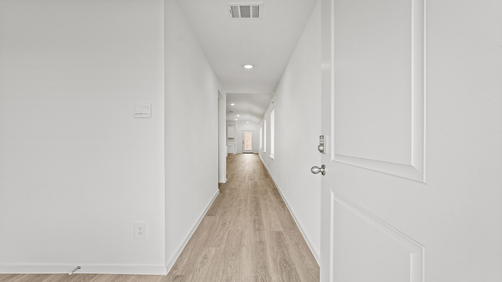 Entry hallway with vinyl flooring