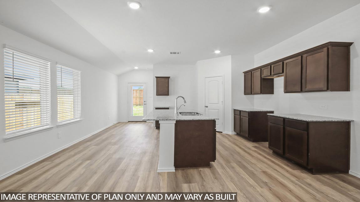 Open concept living, dining, and kitchen area