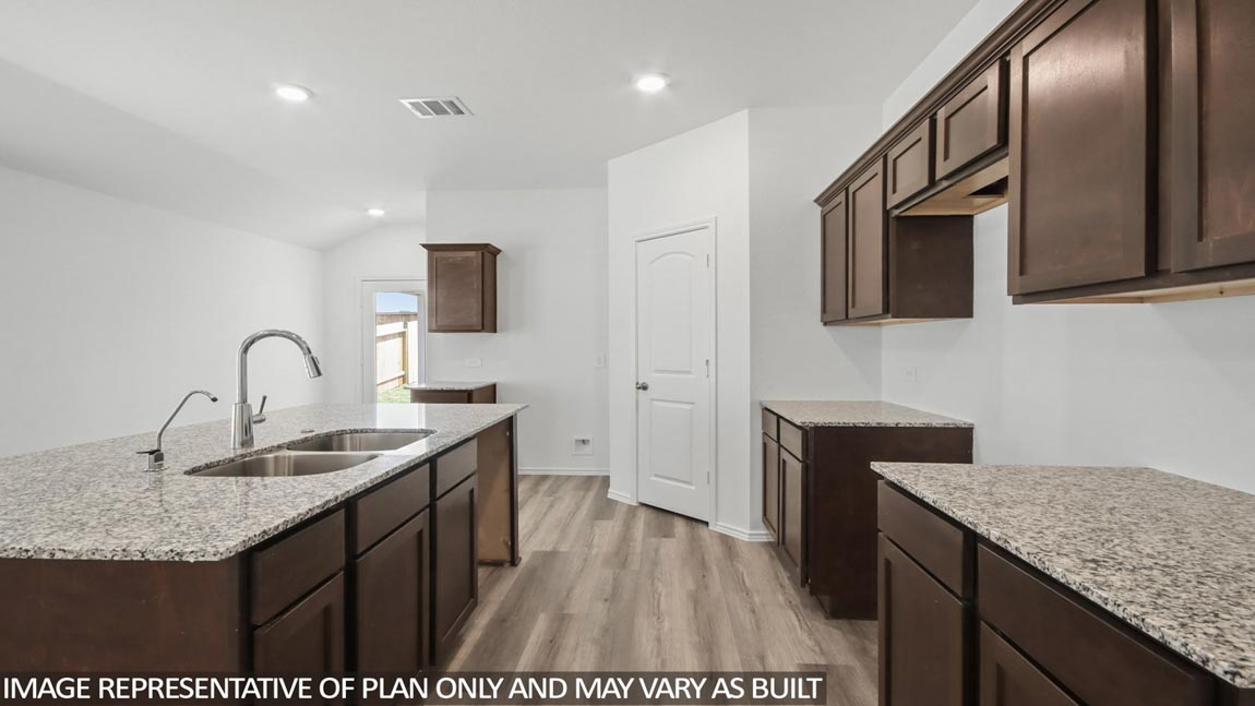 Open concept living, dining, and kitchen area