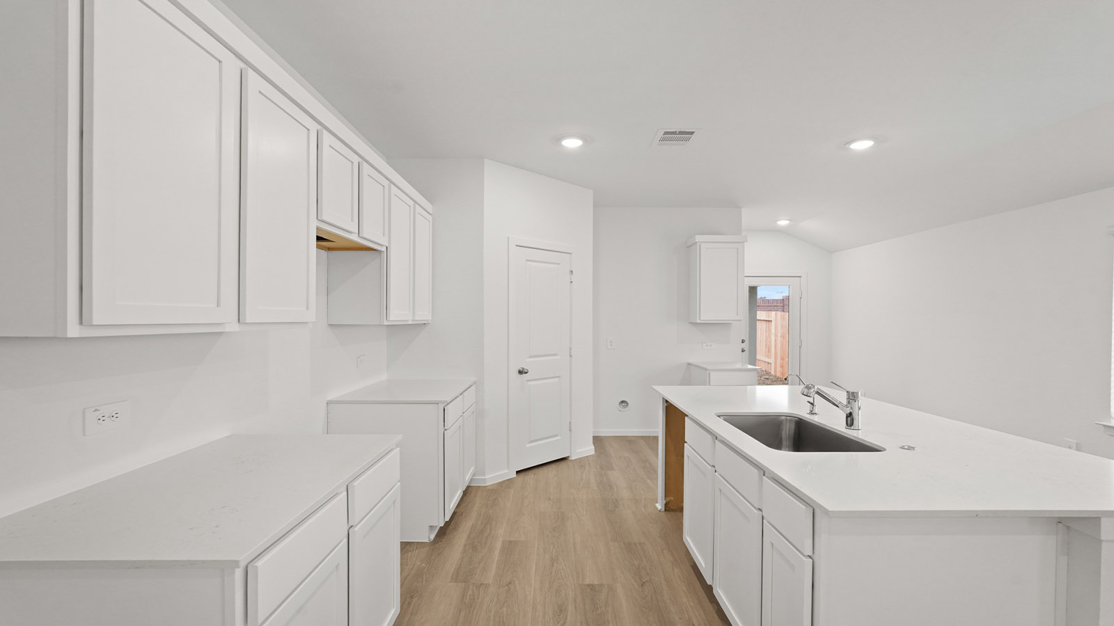 Open concept living, dining, and kitchen area