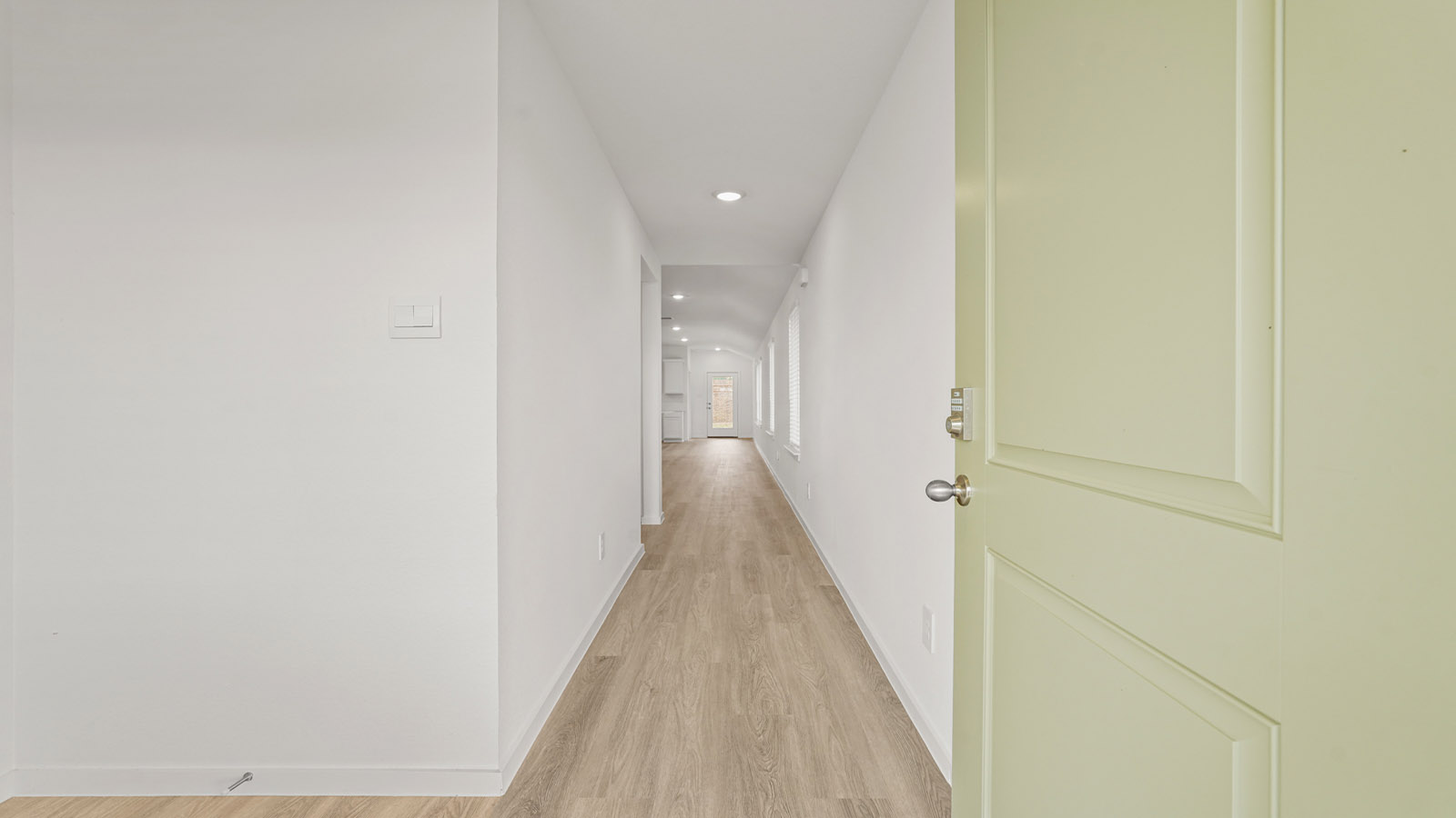 Entry hallway with vinyl flooring