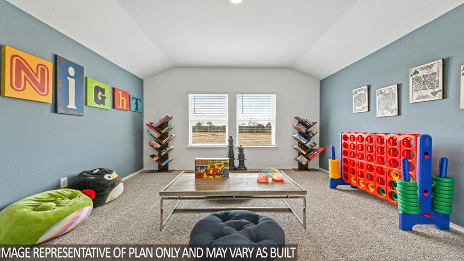 Second story game room with carpet flooring