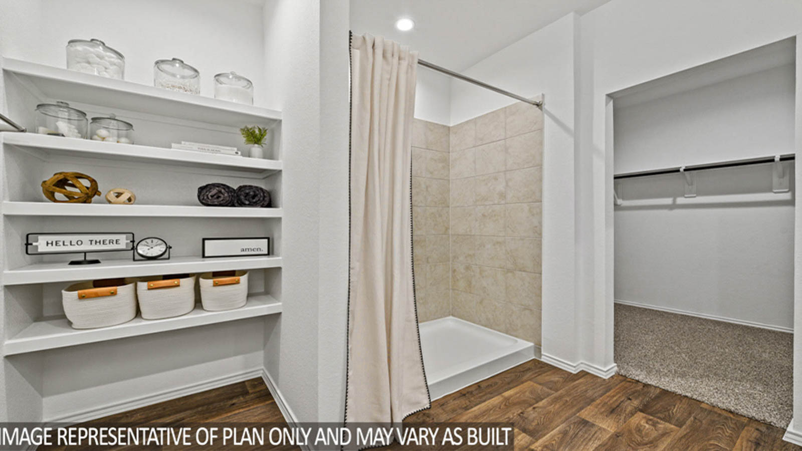 Primary bathroom with a standing shower and a linen nook.