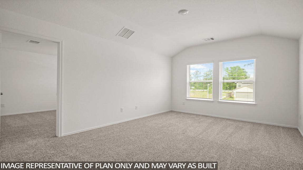 Second story game room with carpet flooring