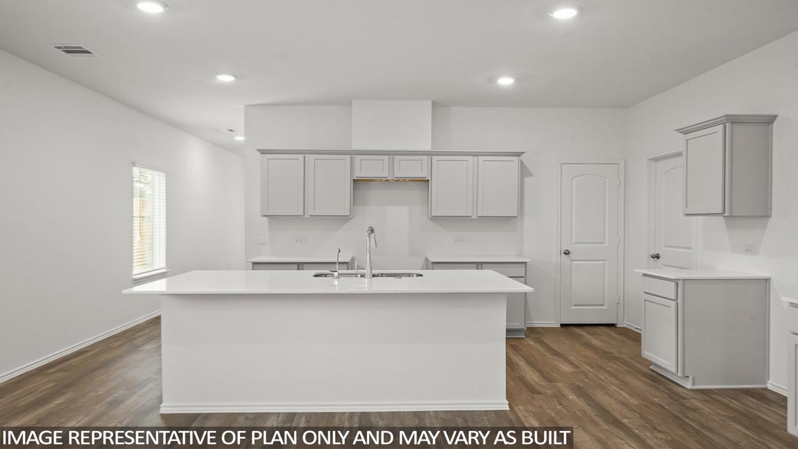 Open concept living, dining, and kitchen area