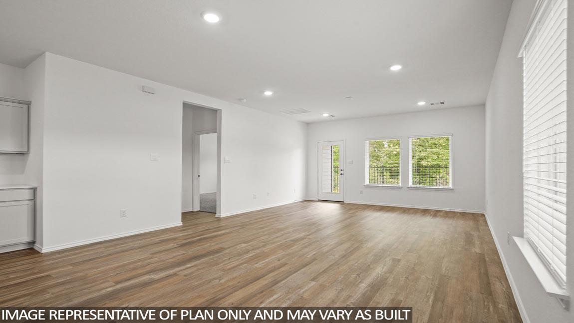 Open concept living, dining, and kitchen area