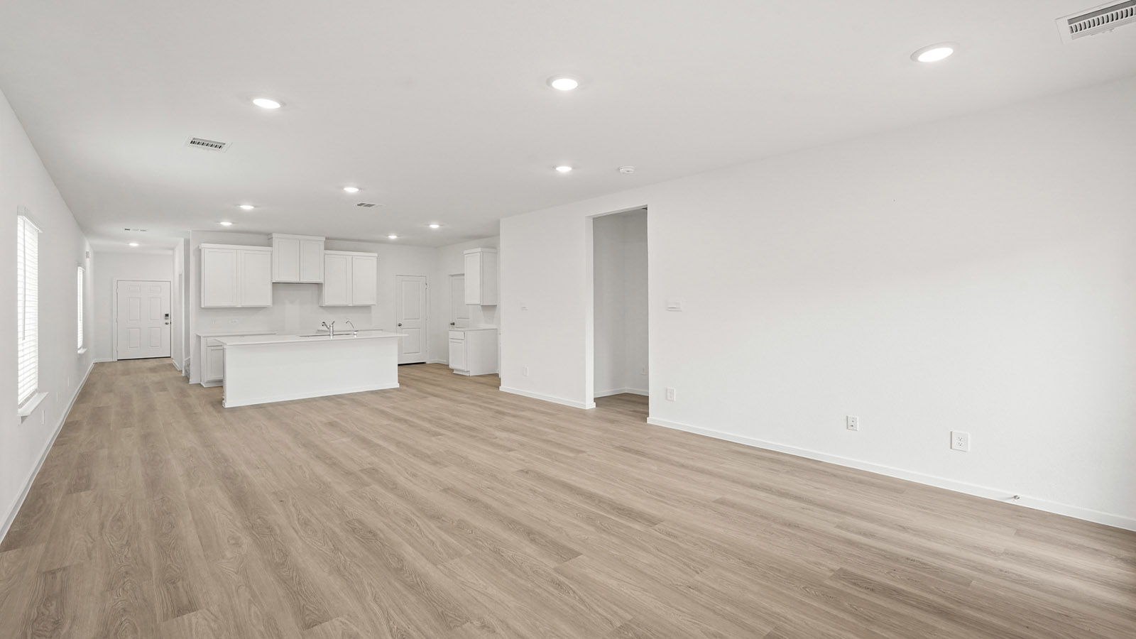 Open concept living, dining, and kitchen area