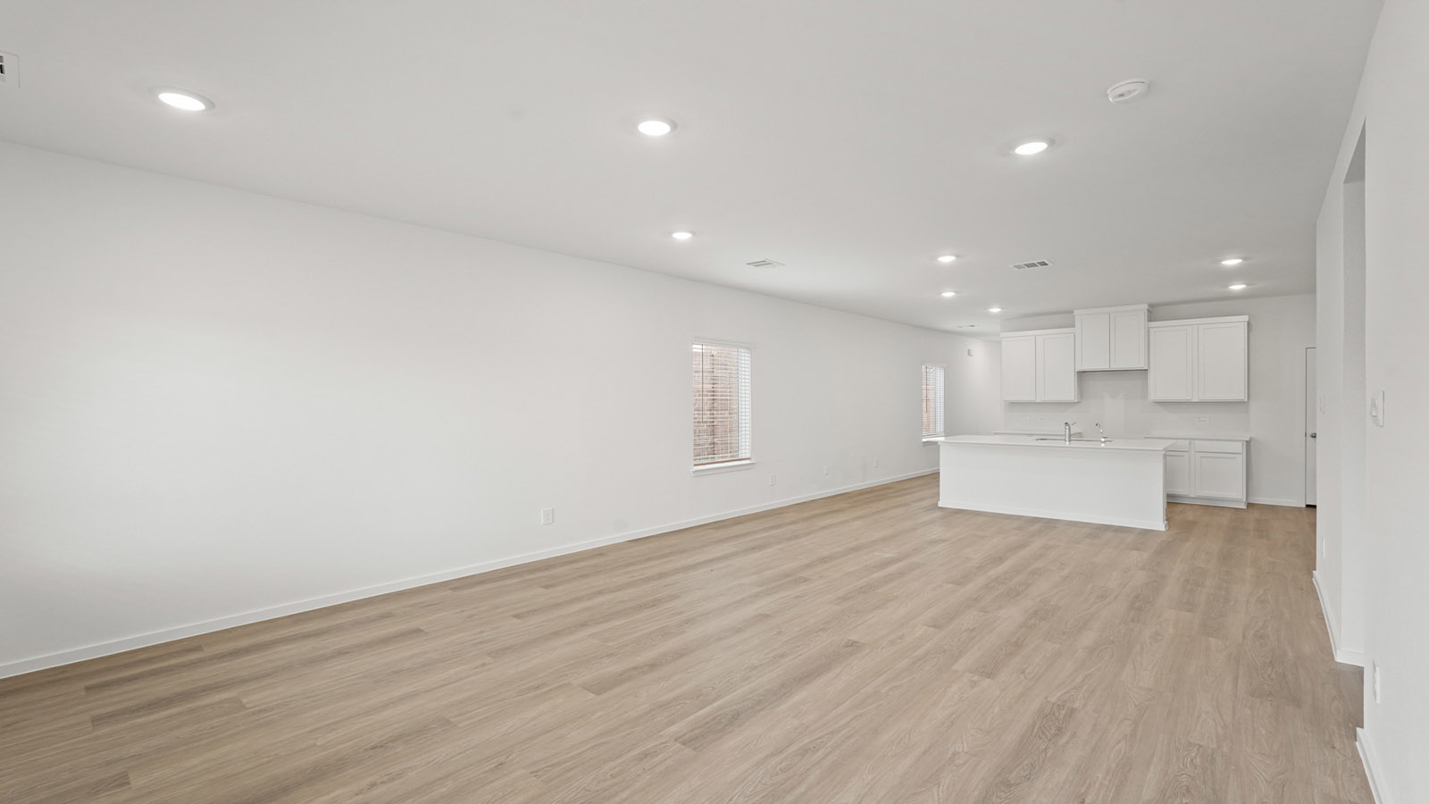 Open concept living, dining, and kitchen area