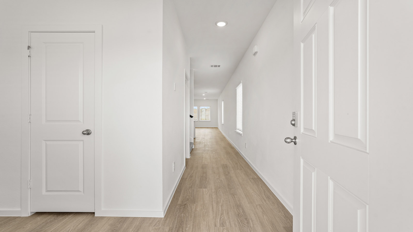 Entry hallway with vinyl flooring