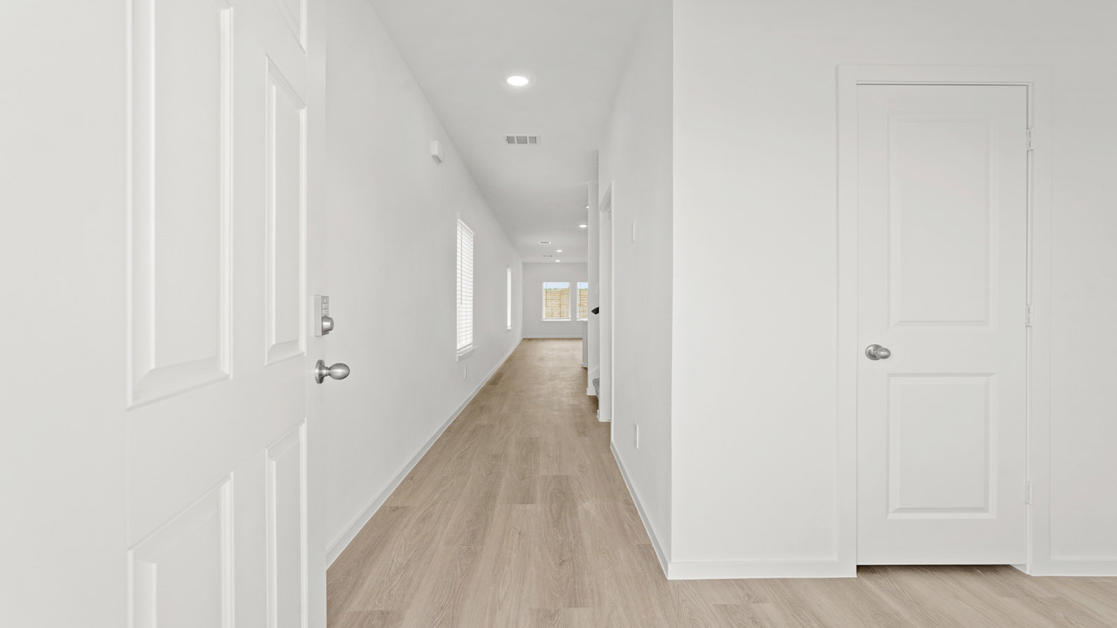 Entry hallway with vinyl flooring