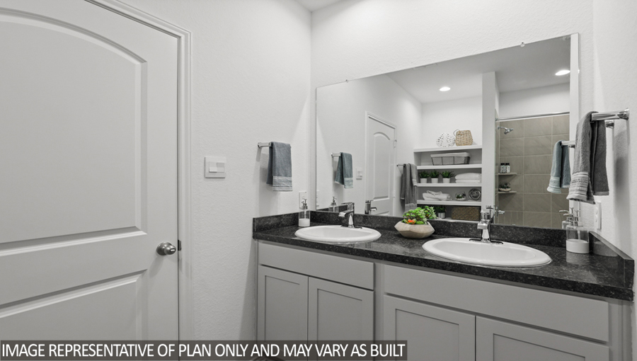 Primary bathroom with a double sink.