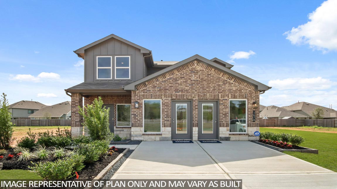 Two-story home with grey highlights and a two-car garage.