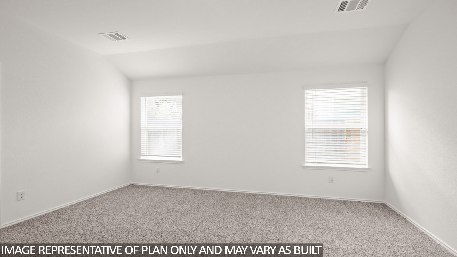 Primary bedroom with carpet flooring