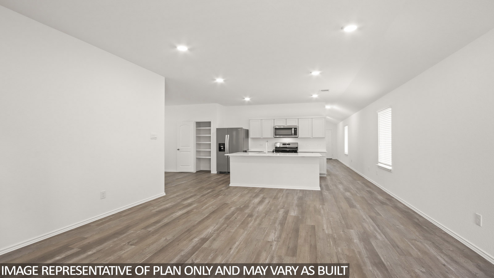 Open concept living, dining, and kitchen area