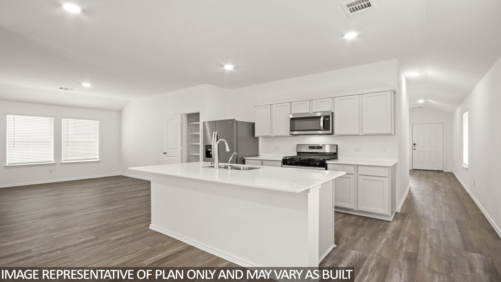 Open concept living, dining, and kitchen area