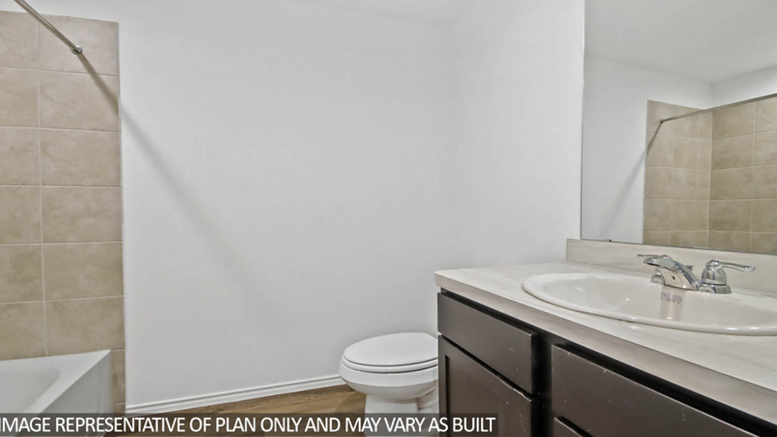 Secondary bathroom with a tile tub/shower combo and vinyl flooring.