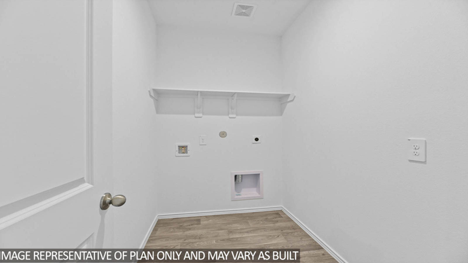 Utility room with vinyl flooring and overhead storage space.