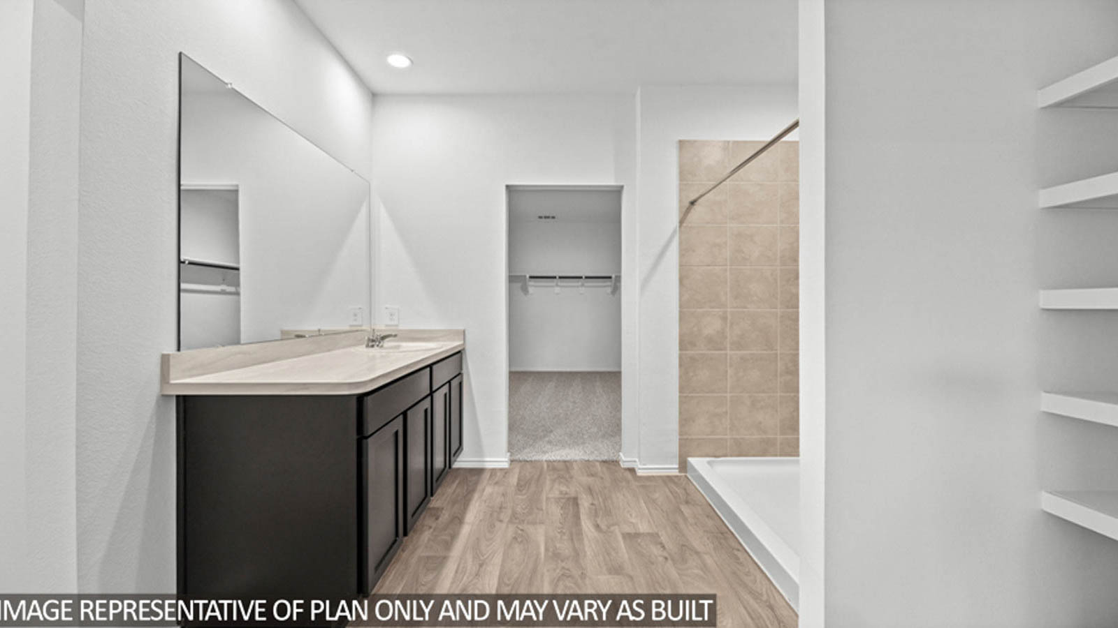 Primary bathroom with vinyl flooring and a linen nook.