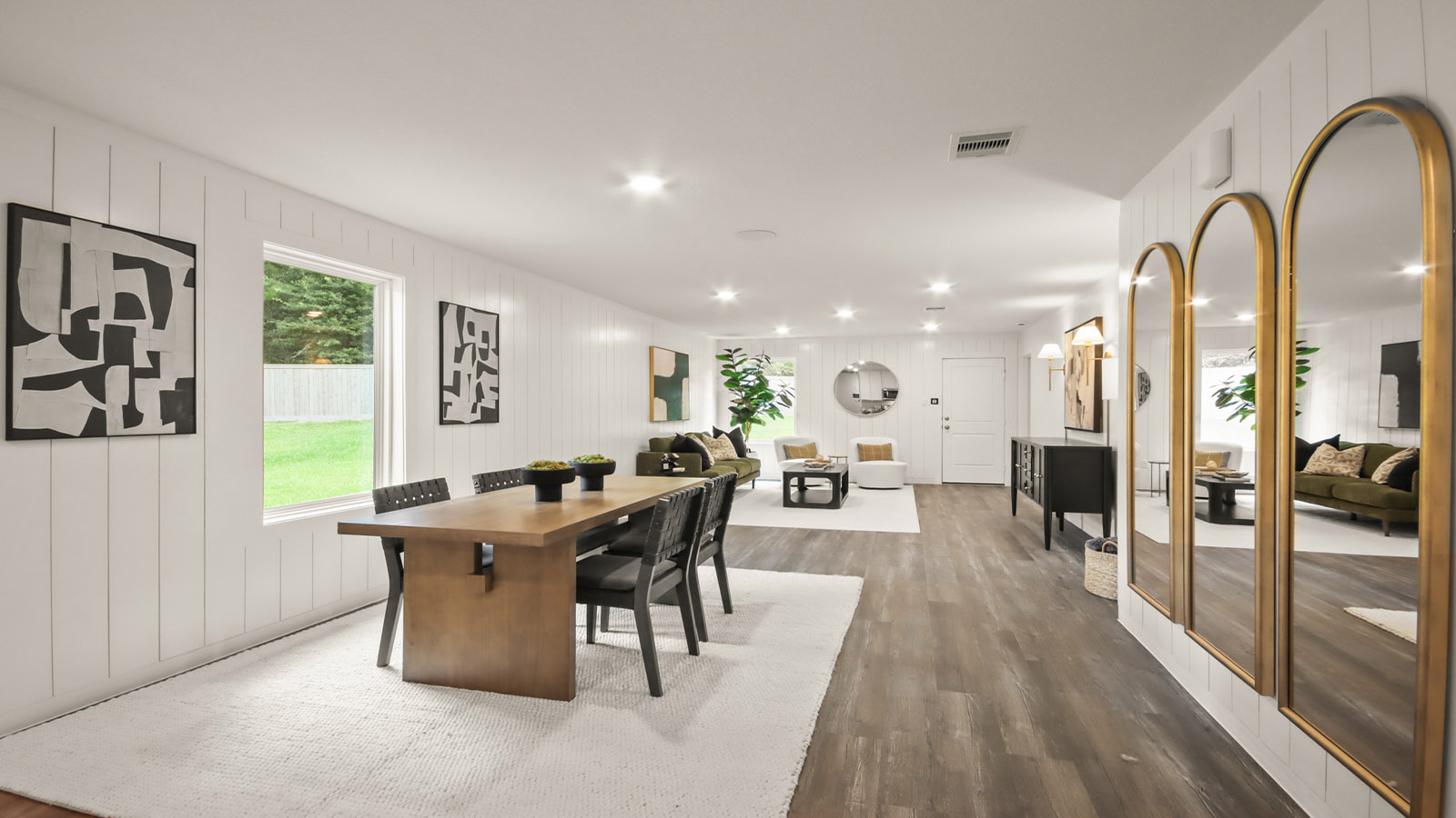 Open concept living, dining, and kitchen area