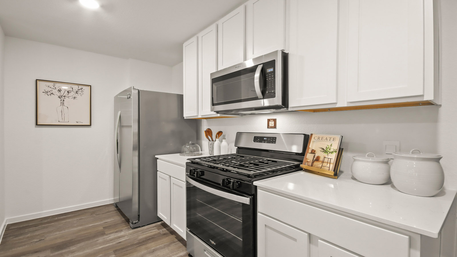 Open concept living, dining, and kitchen area