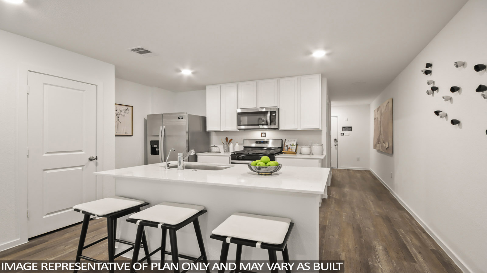 Open concept living, dining, and kitchen area