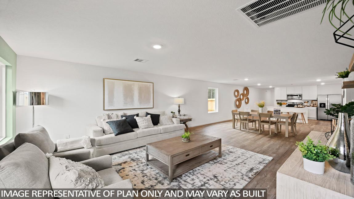 Open concept living, dining, and kitchen area