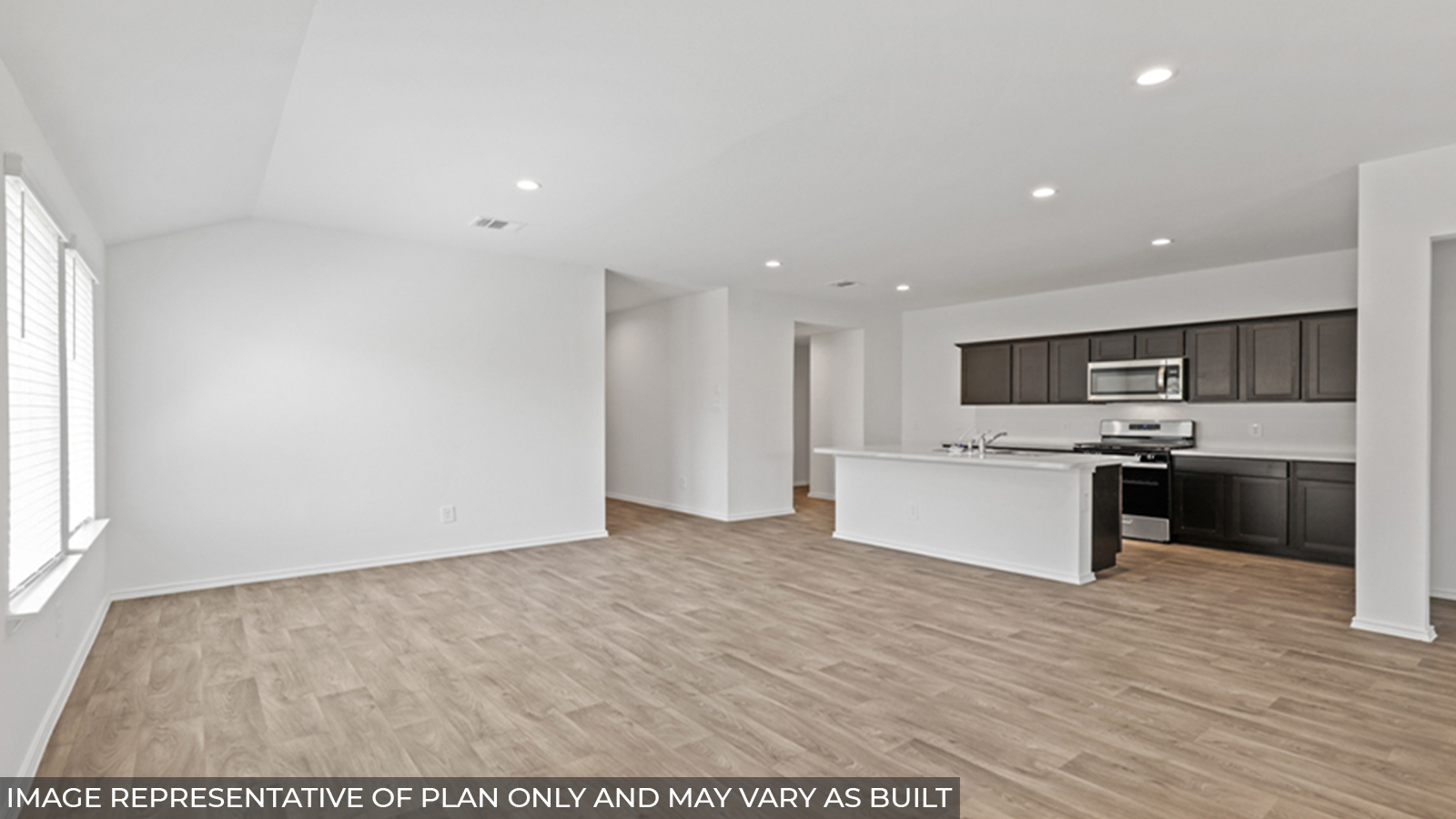 Open concept living, dining, and kitchen area