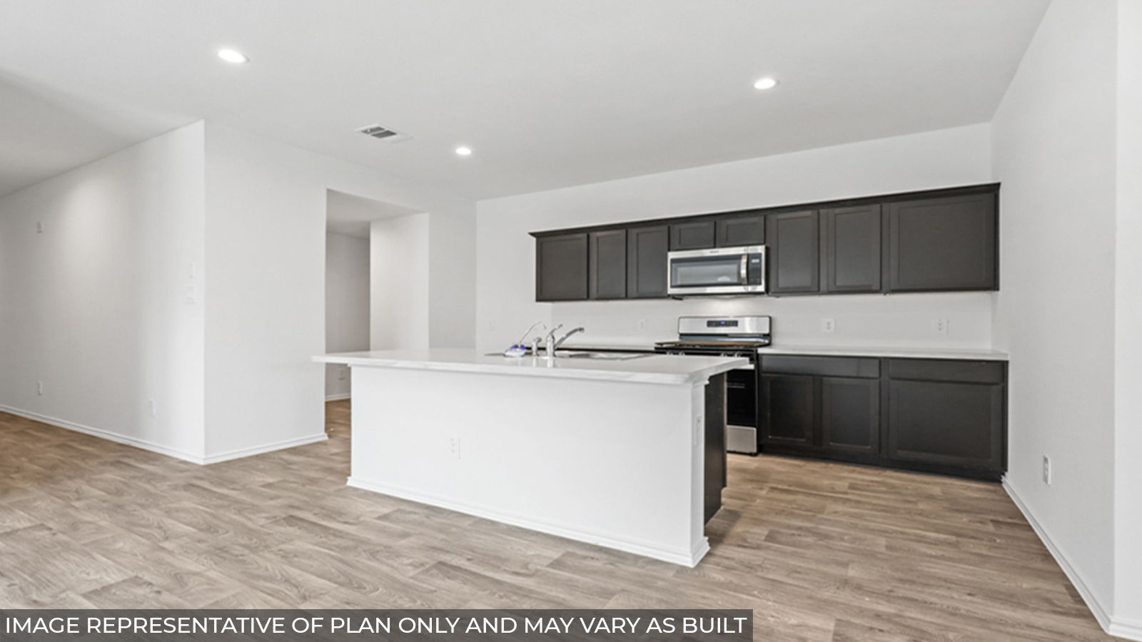 Open concept living, dining, and kitchen area