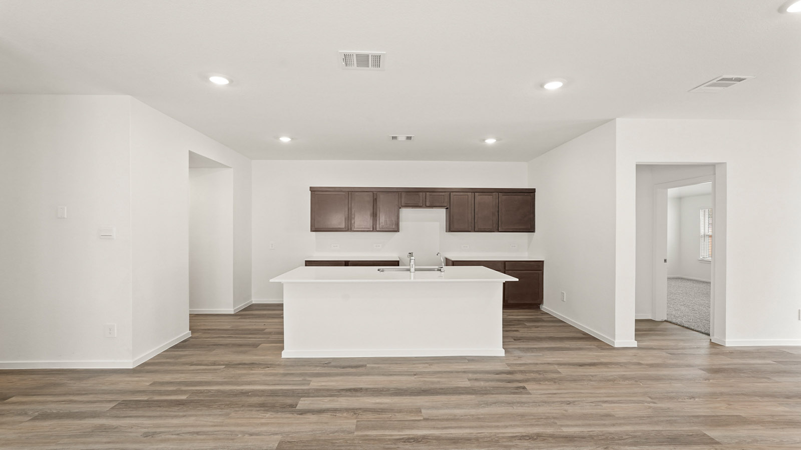 Open concept living, dining, and kitchen area