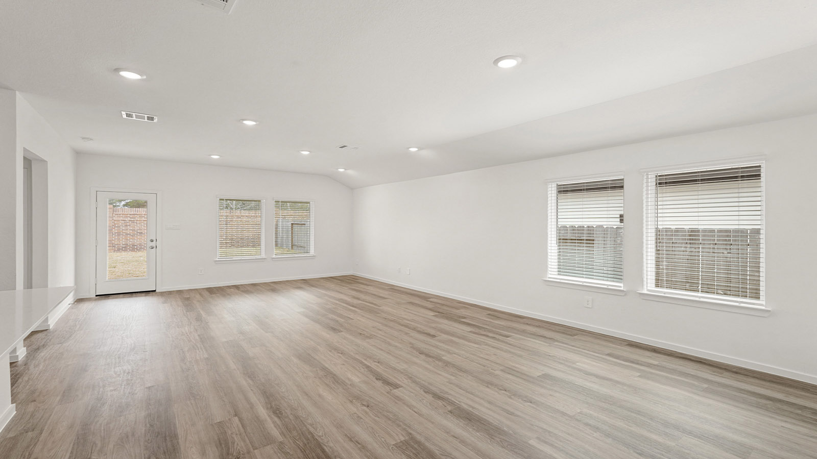 Open concept living, dining, and kitchen area