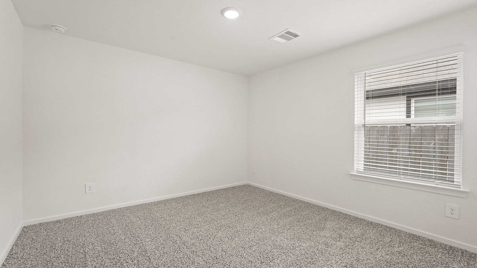 Secondary bedroom with bright window