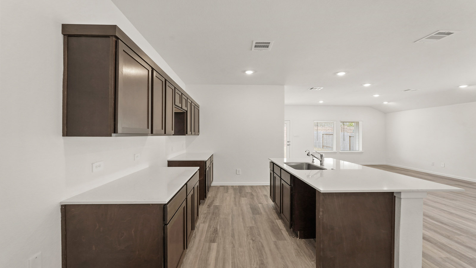 Open concept living, dining, and kitchen area