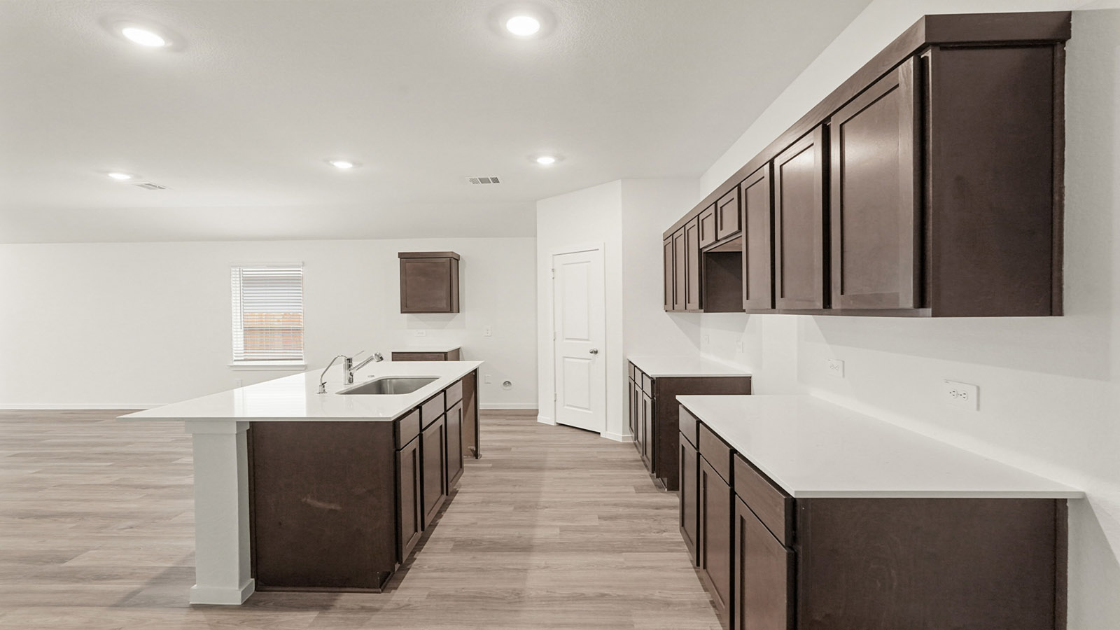 Open concept living, dining, and kitchen area