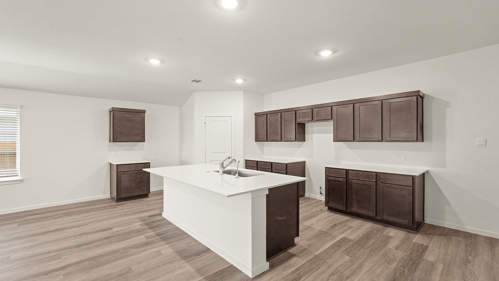 Open concept living, dining, and kitchen area