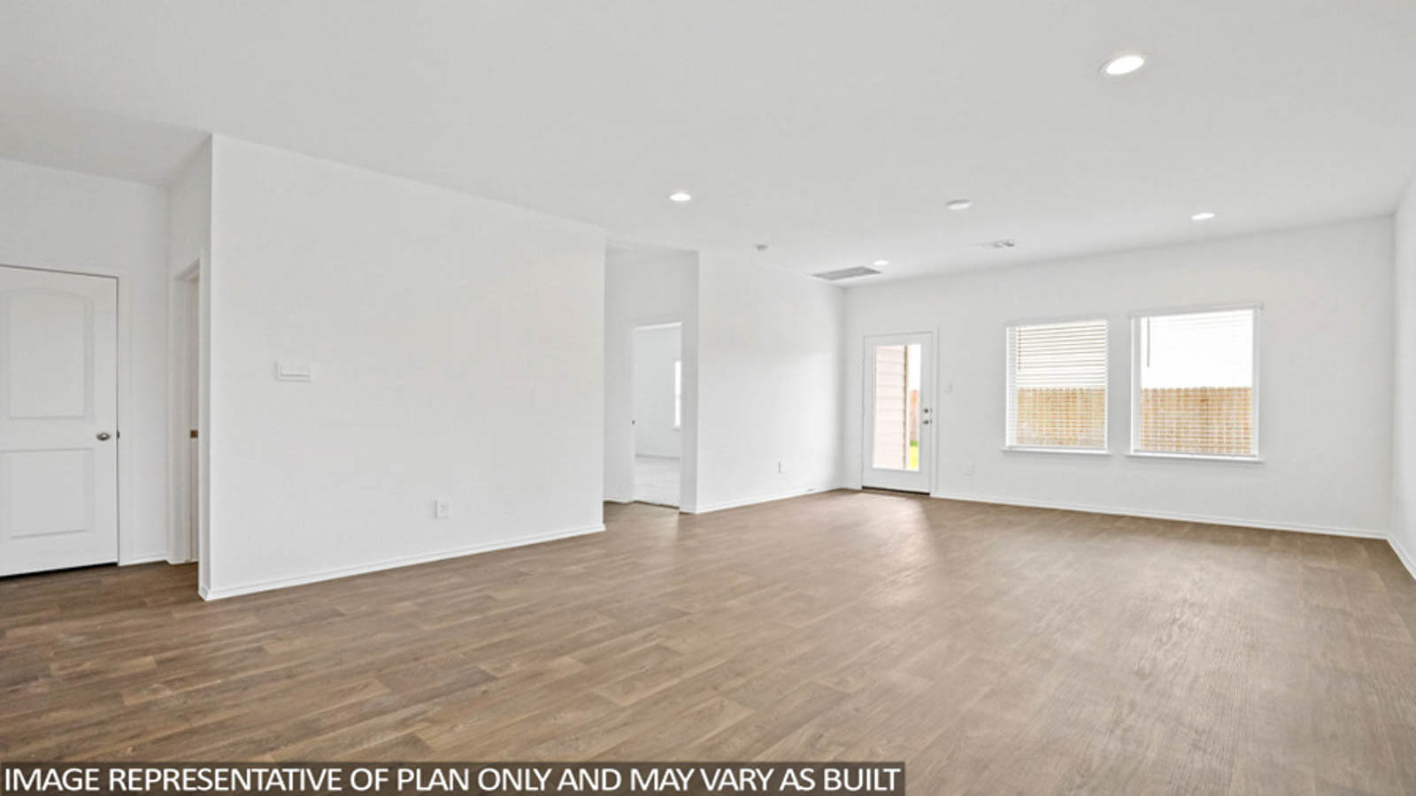 Open concept living, dining, and kitchen area