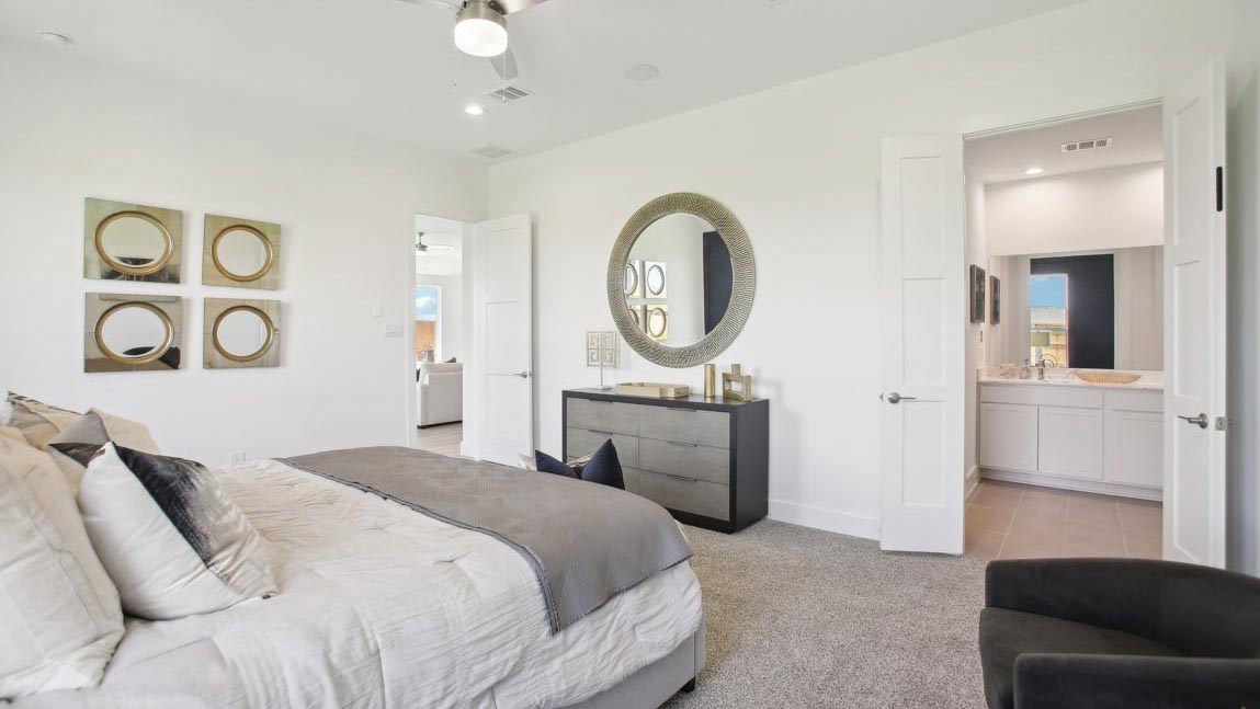 primary bedroom with carpet flooring
