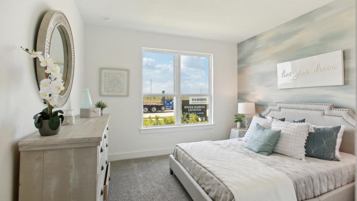 secondary bedroom with bright windows