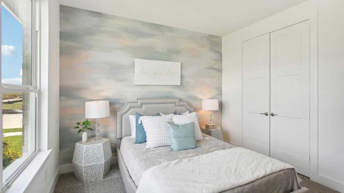 secondary bedroom with bright windows
