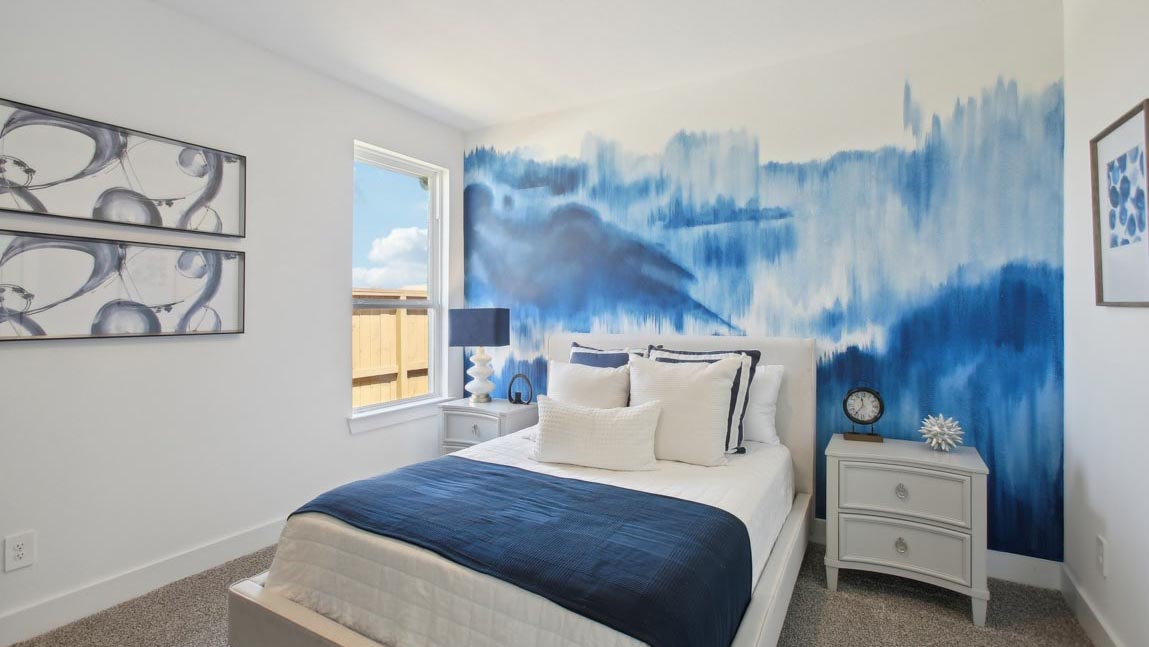 secondary bedroom with bright windows